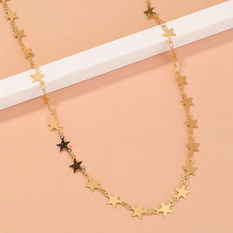 Gold star choker necklace